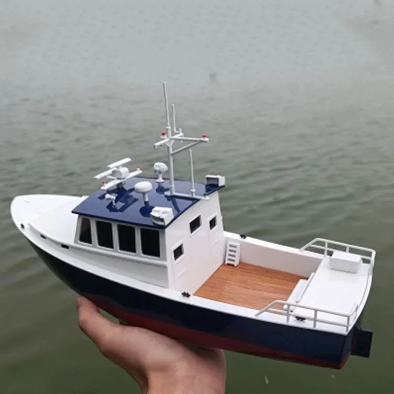 http://www.vajjexrc.com/cdn/shop/files/1-48-RC-Fishing-Boat-Model-Kit-Remote-Control-Boat-Model-Toy-Gift-DIY-Hand-assembled_1b48f9e6-4b63-4410-bc0c-f1d81fe0c78d_1200x1200.webp?v=1711619206